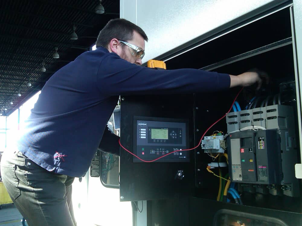 Technician performing system diagnostics